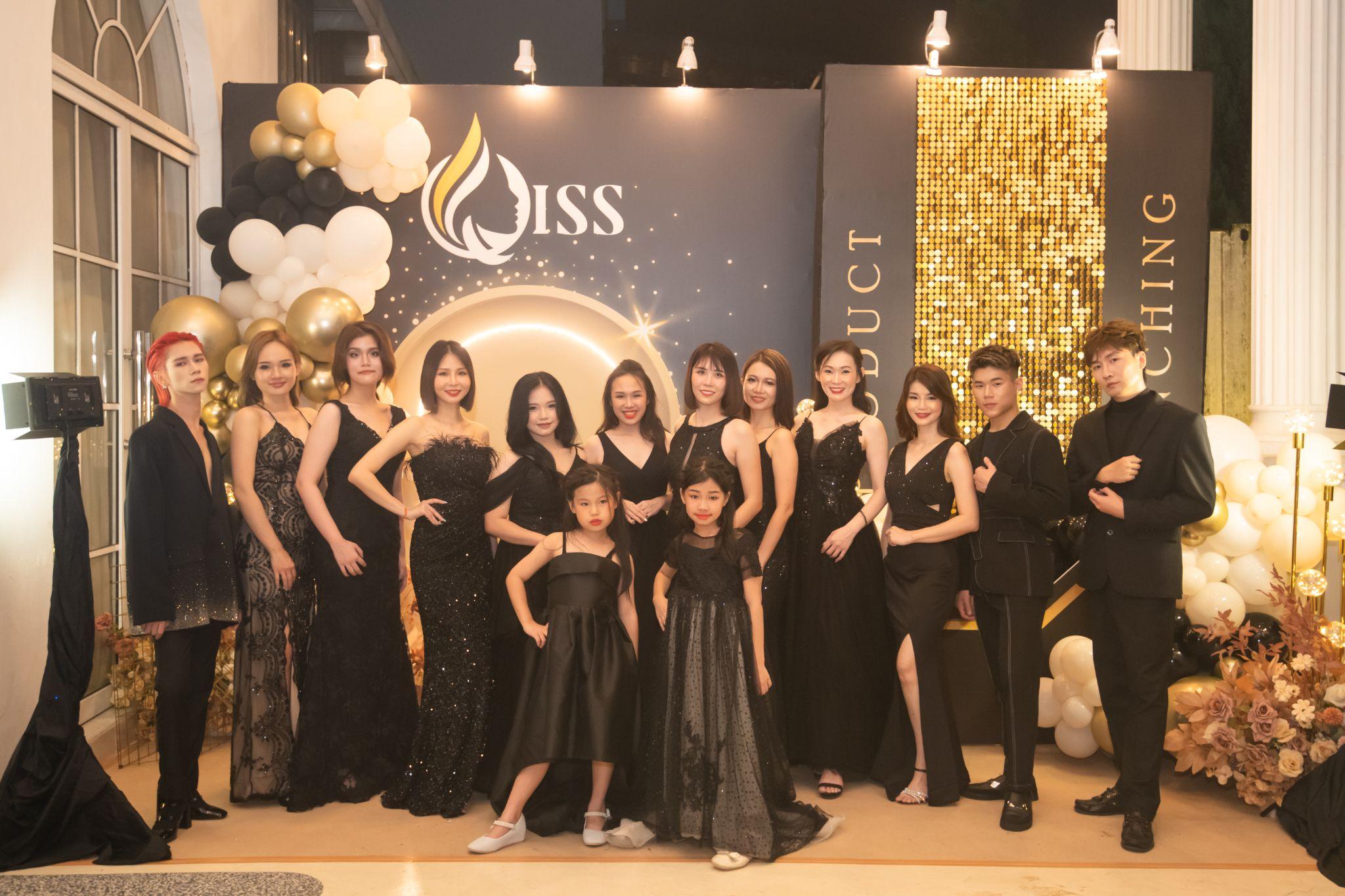 QISS launch guests gathered at the branded photobooth